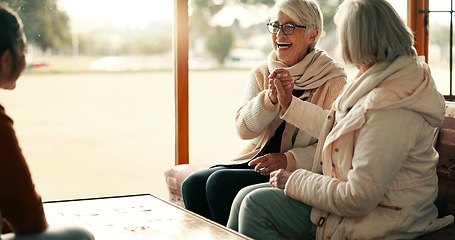 Image showing Bingo, senior friends and women excited in a retirement home with win and bonding. Elderly woman, winning and game with celebration and motivation together with group and board games in a house