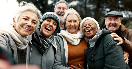 Image showing Happy, selfie and senior friends in a park while walking outdoor for fresh air together. Diversity, smile and group of elderly people in retirement taking picture and bonding in a forest in winter.