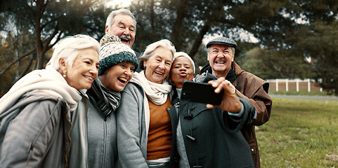 Image showing Excited, selfie and group of senior friends in outdoor green environment for fresh air. Diversity, happy and elderly people in retirement taking picture together while exploring and bonding in a park