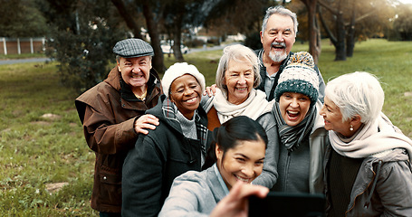 Image showing Nature, selfie and senior friends with woman while walking in outdoor garden for fresh air. Diversity, happy and group of elderly people in retirement taking picture with young female person in park.