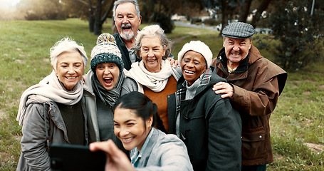 Image showing Nature, selfie and senior friends with woman while walking in outdoor garden for fresh air. Diversity, happy and group of elderly people in retirement taking picture with young female person in park.