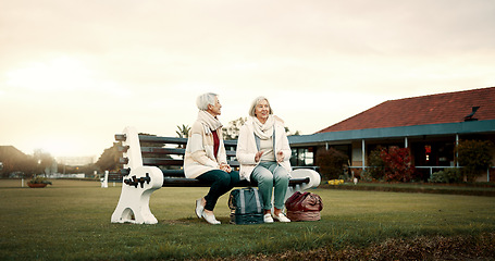 Image showing Talking, senior friends and at a club for sports, fitness break and sitting together after exercise. Happy, relax and elderly women on a field bench for conversation, retirement hobby or activity