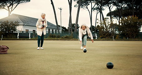 Image showing Women, park or old people bowling for fitness, training or exercise for wellness or teamwork outdoors. Senior ladies, relax or elderly friends playing fun ball game or sport in workout together