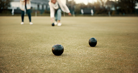 Image showing Women, park or old people bowling for fitness, training or exercise for wellness or teamwork outdoors. Senior ladies, relax or elderly friends playing fun ball game or sport in workout together