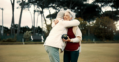 Image showing Bowling success, hug and women on a field with teamwork, support and celebration in sport. Happy, win and senior friends excited about a game or competition in a park for retirement hobby together