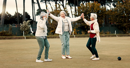 Image showing Senior women, celebration and park for sport, lawn bowling and happy for fitness, goal or applause in nature. Teamwork, elderly lady friends and metal ball for games, contest or win together on grass