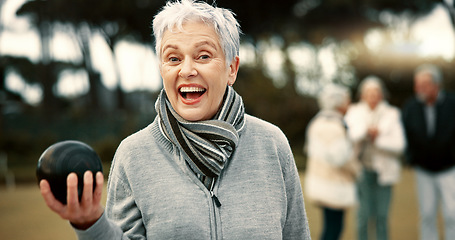 Image showing Senior woman, lawn bowling and park with face for sport, fitness or game for competition, health or fun. Elderly lady, metal ball and grass for contest, excited smile or workout in outdoor portrait