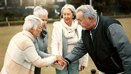 Image showing Hands, motivation and senior friends in a huddle outdoor for support, celebration or unity during a game. Teamwork, trust and community with a group of elderly people in a park for team building
