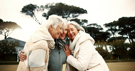 Image showing Talking, laughing and elderly woman friends outdoor in a park together for bonding during retirement. Happy, smile and funny with a group of senior people hugging in a garden for humor or fun