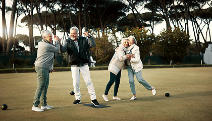 Image showing Bowls, high five and celebration with senior friends outdoor, cheering together during a game. Motivation, support or applause and a group of elderly people cheering while having fun with a hobby