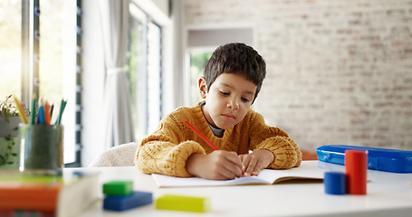 Image showing Home learning, math education or boy in kindergarten studying for knowledge or growth development. Focus, assessment or smart child writing or counting on numbers to study for test in notebook alone