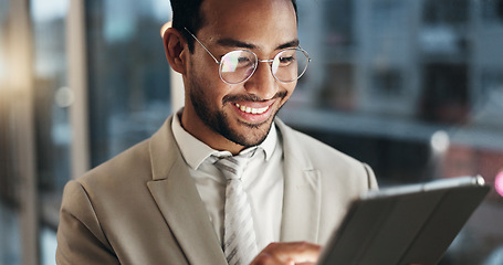 Image showing Office tablet, face and happy man typing, scroll or check research data, planning or reading customer experience analytics. Night report, feedback review and media analyst work on project statistics