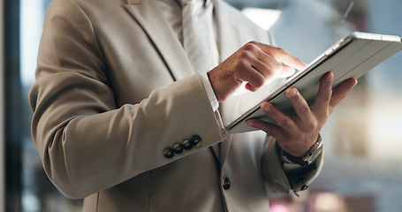 Image showing Office tablet, night and hands of person typing, scroll or check research, planning or customer experience analysis. Feedback review, closeup and professional media analyst working on online project