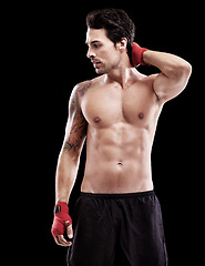 Image showing Man, thinking and fitness with fighter in a studio ready for boxing training and workout. Body, athlete and male boxer from Brazil with exercise, sport and wellness for battle with black background