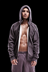 Image showing Fitness, fashion and portrait of man with hoodie in studio for workout, clothes or style on black background. Gym, outfit and topless male model pose with confidence, abs and body training results