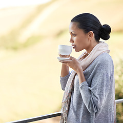 Image showing Woman, drink coffee on balcony and outdoor to relax with warm beverage and morning routine for zen in nature. Peace, calm and espresso for caffeine, view and mockup space with tea cup in countryside