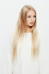 Image showing Woman, natural and beauty in haircare, cosmetics or makeup on a white studio background. Face of young female person, blonde or attractive model with long healthy hairstyle, glow or shine on mockup