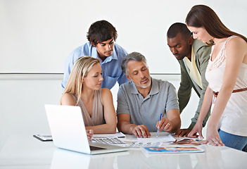 Image showing Man, colleagues and project collaboration with paperwork in office or fashion magazine, brainstorming or company. Group, teamwork and together or design development at agency for notes, edit or job