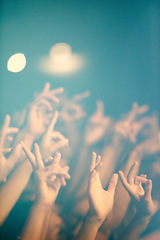 Image showing Rock concert, crowd and people with music and hands with musician, excitement and fans. Group and shouting with audience, festival and party with celebration, entertainment or social with performance