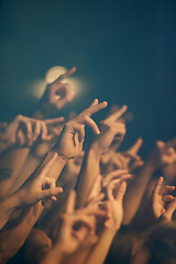 Image showing Rock concert, hands and music festival with people, event and party with fun and entertainment. Freedom, energy or crowd screaming with excitement and social with audience or group with performance