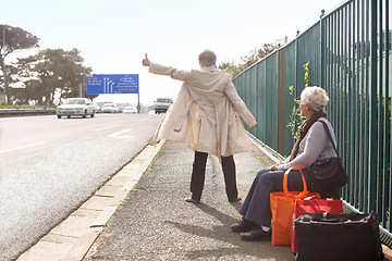 Image showing Senior people, hitchhiking and traveling on road, retirement and waiting for taxi or cab in city. Elderly women, back and outdoor journey or trip in town, friends and roadside assistance on street