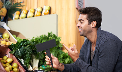 Image showing Barcode check, food or man shopping at a supermarket for grocery promotions, sale or discounts deal. Price marker, machine or customer buying groceries for healthy diet, organic vegetables or spinach