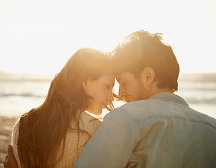 Image showing Romantic love, sunset and beach couple relax with summer sunshine, wellness and bonding on travel holiday in Greece. Forehead touch, romance and back of people connect with care, support and security