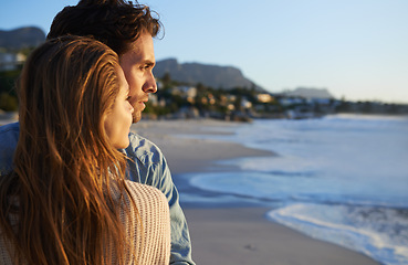 Image showing Beach, romantic love and couple with view, outdoor wellness or travel vacation in Greece. Mockup space, relationship and face of marriage partner, soulmate or people looking at nature, sea or ocean