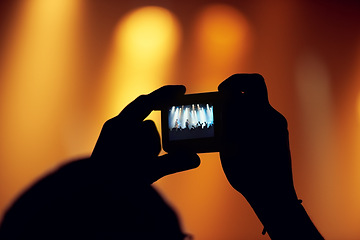 Image showing Hands, cellphone or image of band at concert, music event or audience with flashlight in bokeh. Person, photography or graphic on smartphone, technology or celebration with crowd at disco performance