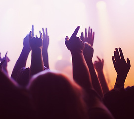 Image showing Rock concert, hands and music festival with people, energy and party with fun and entertainment. Freedom, dance or crowd screaming with excitement and social with audience or group with celebration