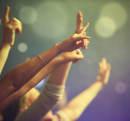 Image showing Rock concert, hands and music festival with people, lights and party with performance and entertainment. Celebration, energy or crowd shouting with excitement or event with audience or group with joy