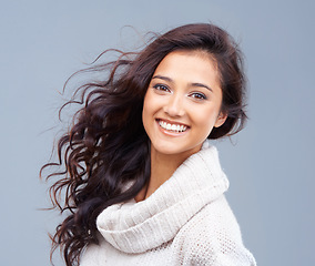 Image showing Hair care, beauty and happy portrait of woman with healthy glow on skin in gray background of studio. Dermatology skincare and girl with smile with pride for shine in hairstyle or treatment in Brazil
