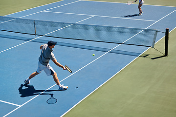 Image showing Sport, people and tennis on court with game, competition and performance outdoor with fitness and energy. Athlete, player and ball on turf for training, exercise and racket with fun, action and hobby