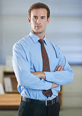 Image showing Portrait, serious and business man with arms crossed, pride in corporate career and employee in office. Face, confident professional consultant and entrepreneur working at a company in Australia