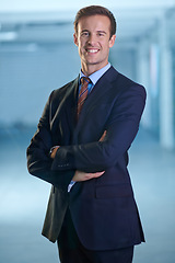 Image showing Portrait, smile and business man with confidence for pride in corporate career in office. Face, arms crossed and happy professional lawyer, attorney and employee in a suit at a company in Australia