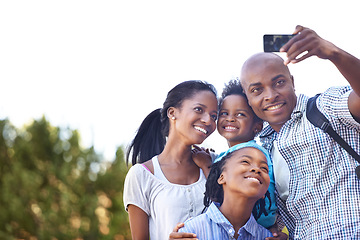 Image showing Happy black family, selfie and photography in nature for hiking, bonding or outdoor photo together. African mother, children and father smile taking picture or photograph for adventure in forest