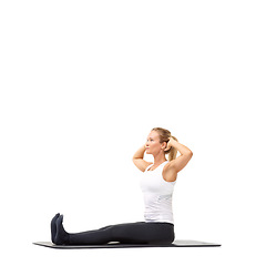 Image showing Fitness, health and workout woman in studio for relax, exercise and wellness. Training, gym and self care with female person on floor of white background for pilates, body and mockup space