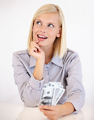 Image showing Thinking, woman and money with financial idea, investment and savings for budget with reward. Wealth, wondering and happy person with cash profit from work bonus in studio with white background