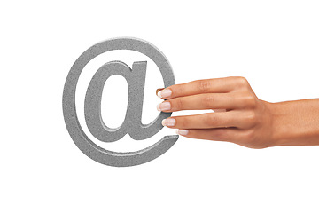 Image showing Hands, @ font and letter on a white background in studio isolated on mockup or copy space. Fingers, palm and at symbol, sign and closeup of character icon for address, communication and alphabet