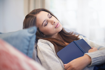 Image showing Woman, book and literature for sleeping or resting, home and fiction novel for knowledge. Female person, student and information for learning, dreaming and fatigue from studying on weekend in house