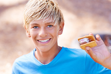 Image showing Child, portrait and marshmallow smores while camping outdoor for dessert snack, adventure or summer. Boy, kid and face smile with chocolate or cookie for food cooking or hungry, sweet or environment