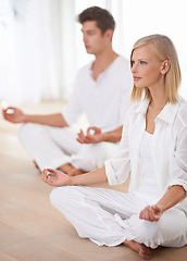 Image showing Meditation, lotus hands and people on a floor for peace, zen and mental health, wellness or balance. Mindfulness, relax and couple with holistic, breathing or energy exercise for spiritual awareness