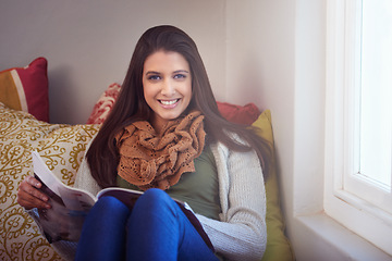 Image showing Woman, portrait and reading magazine to relax at home, information and news for knowledge. Female person, relaxing and happy for announcement in publication, morning routine and story update on sofa