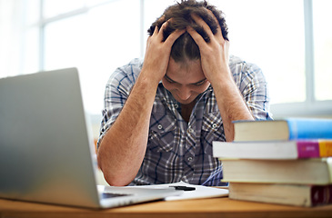 Image showing Student, headache and stress for education, college or e learning test, bad results or time management fail. Man with anxiety, depression and confused or frustrated for university research on laptop