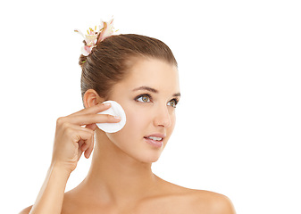 Image showing Skincare, face or cotton pad for woman in studio for wellness, shine or glow on white background. Cleaning, beauty or model with facial swab for makeup, removal or thermal water, toner or application