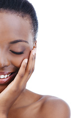 Image showing Face, smile and skincare natural black woman in studio isolated on white background fpr spa treatment. Half, beauty or wellness and happy young model touching face with hands for dermatology