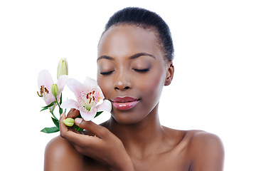 Image showing Black woman, flower and natural beauty, dermatology and skincare for glow and wellness on white background. Nature, healthy skin and sustainable cosmetics, face with shine and orchid in a studio