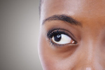 Image showing Half, face and eye of woman with vision for contact lenses and healthcare in studio background mockup. Optometry, eyesight and African model seeing, visual or search perception in optical exam