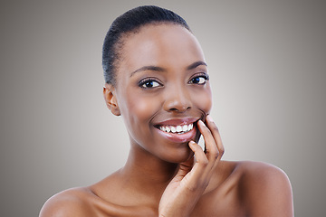 Image showing Portrait, black woman and beauty from skincare and dermatology in studio, background or salon. Facial, glow and smile with natural makeup and healthy shine on skin from cosmetics and self care mockup