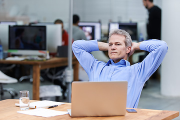 Image showing Mature, businessman and thinking by laptop in workplace, planning and professional with technology in office. HR, manager and smartphone by stationary on desk and idea for staff training in company